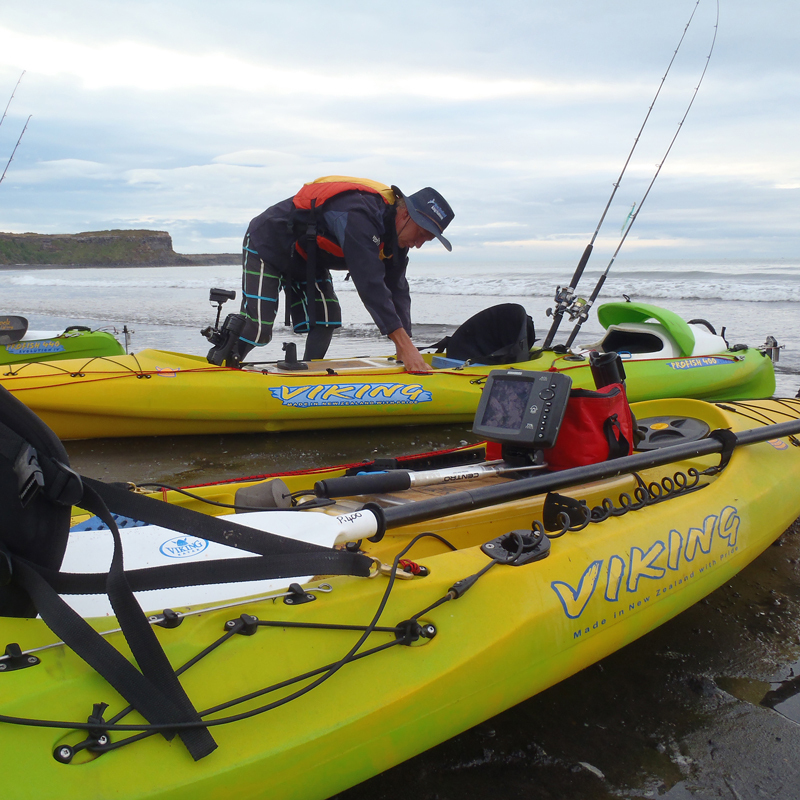 Viking kayaks about to go fishing at the beach